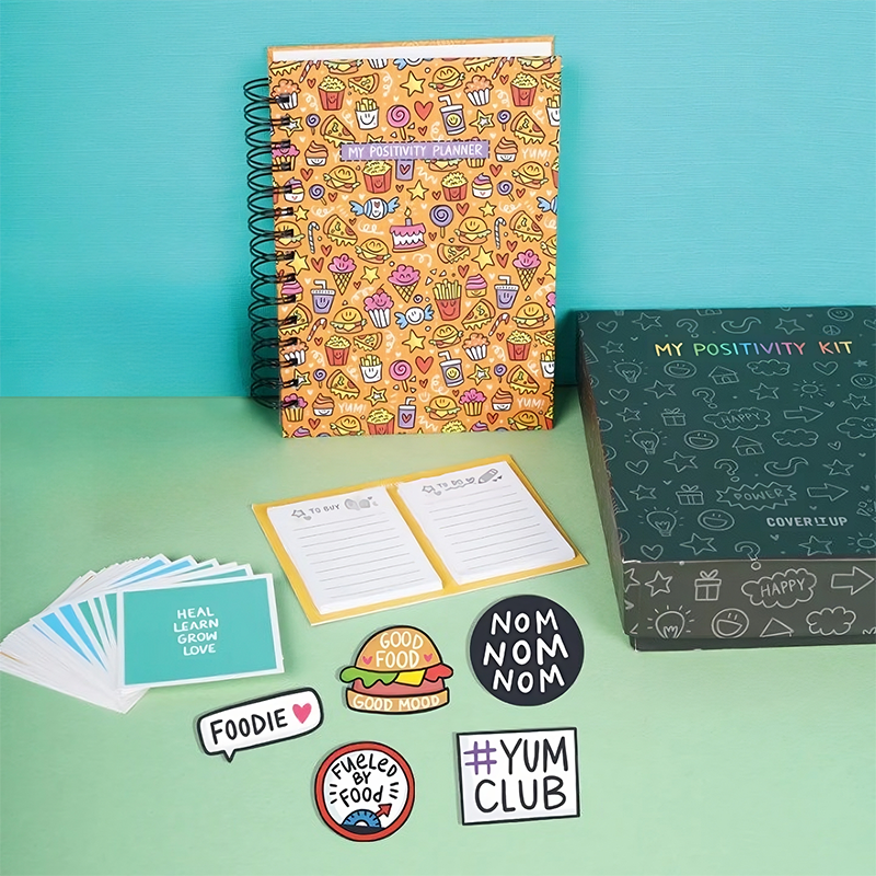 The Positivity Planner 2025 - Fun Orange Food Themed Printed Planner